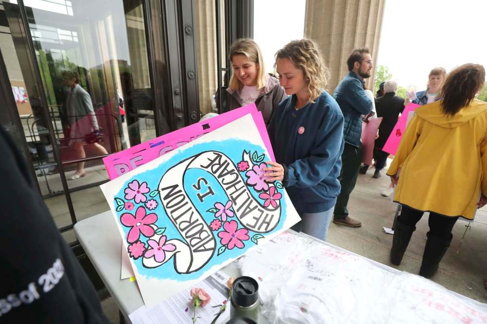 Rally at the legislature Monday celebrates the recent announcement of universal coverage of abortion pill Mifegymiso while calling for greater availability. (Ruth Bonneville / Winnipeg Free Press)