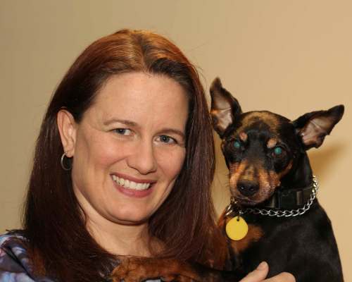 Veterinarian Dr. Sarah Silcox poses with her dog, Blackberry. (Supplied)