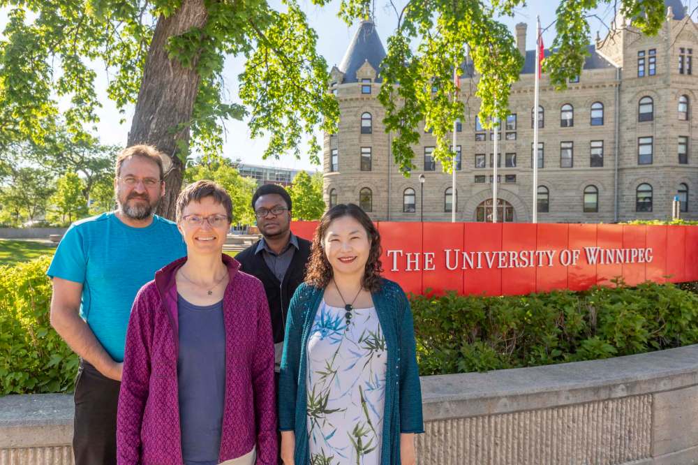 Michael Thibert (From left), Lilli Williams, Widney Pervil and Ji-Yung Jennifer Choi are four of the six members of the last class of theology students to graduate from the University of Winnipeg. (Sasha Sefter / Winnipeg Free Press)