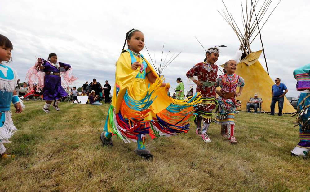 RUTH BONNEVILLE / WINNIPEG FREE PRESS
Celebrate National Indigenous Peoples Day on Kapyong Barracks Lands (Lipsett Hall land). Fancy Shawl dancer Linlea Lavaliere (yellow, 7yrs old) dances with other tiny tot indigenous dancers at the celebration ceremony for National Indigenous Peoples Day at Kapyong Barracks Lands Friday.