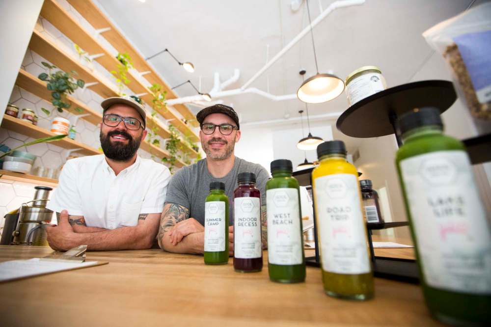 Giorgo Mantas (left) and Rob Bohay are co-owners of Verde Juice Bar. (Mikaela MacKenzie / Free Press files)