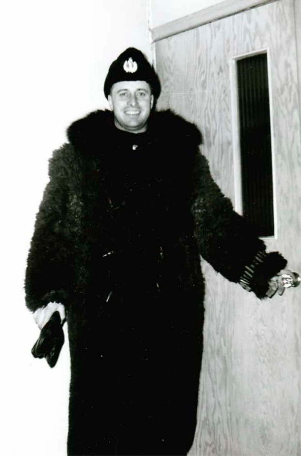 Off to work in 1953 in his buffalo coat.