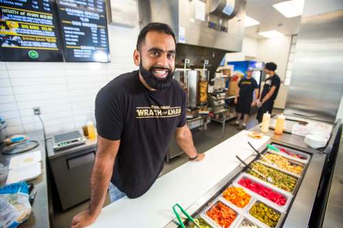 MIKAELA MACKENZIE / WINNIPEG FREE PRESS
Khan now owns and operates three Shawarma Khan restaurants and a trio of Shawarma Khan In A Snap outlets at IG Field and is co-owner of three Green Carrot Juice Company shops.