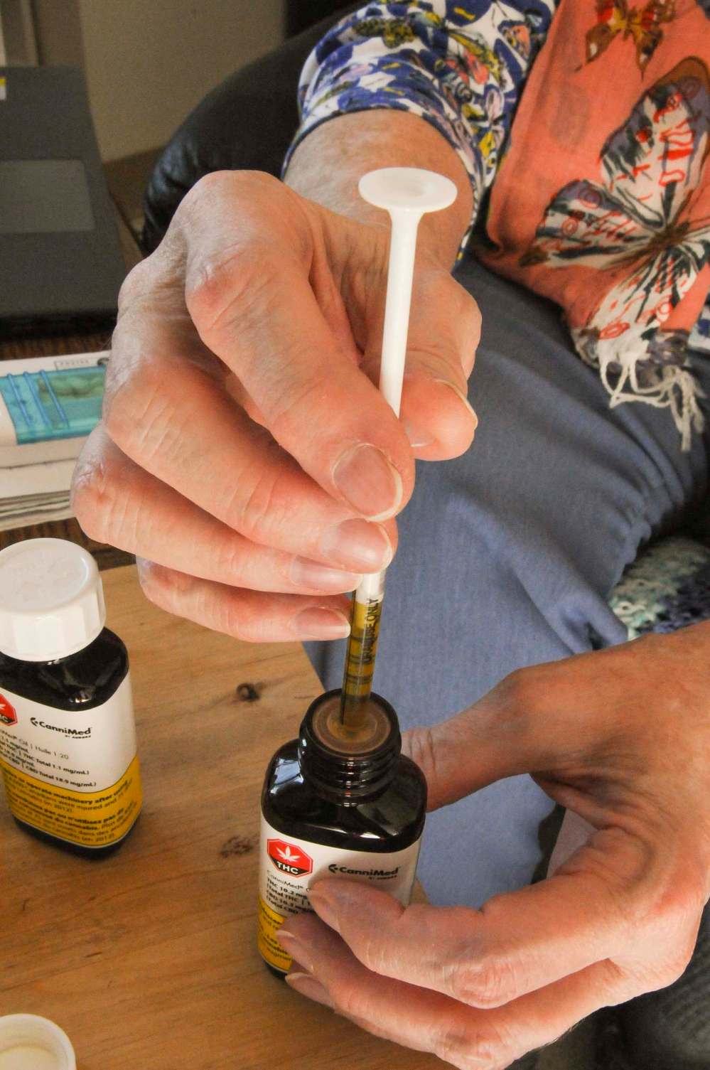 Sandi Krasowski / Winnipeg Free Press
McMillan uses a syringe to extract cannabis oil.