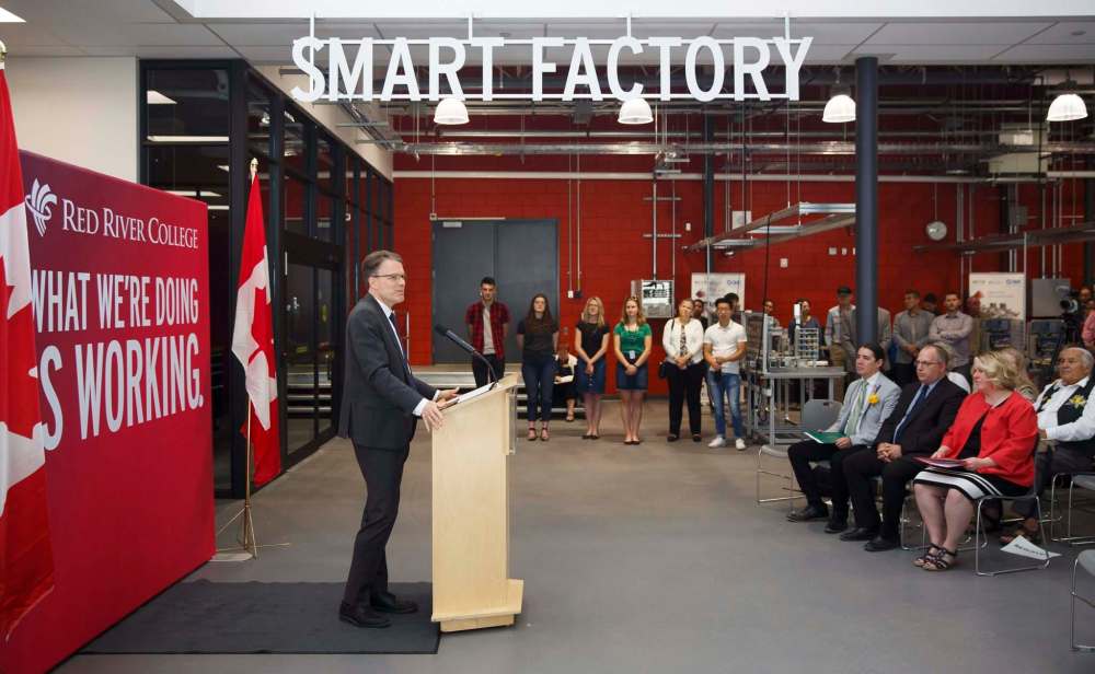 MIKE DEAL / WINNIPEG FREE PRESS files
Paul Vogt, president and CEO of Red River College, speaks during the official opening ceremony of the college’s Smart Factory in June. The college isn’t renewing Vogt’s contract when it expires next year.