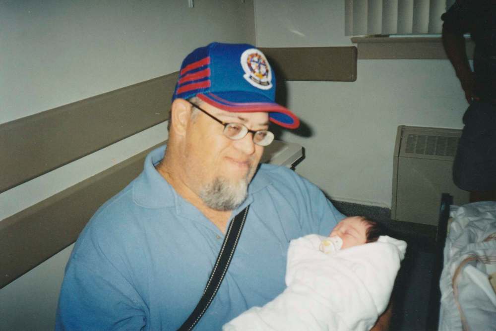 Bob, who loved being an uncle, is seen with his great-niece Aimie in 2002.