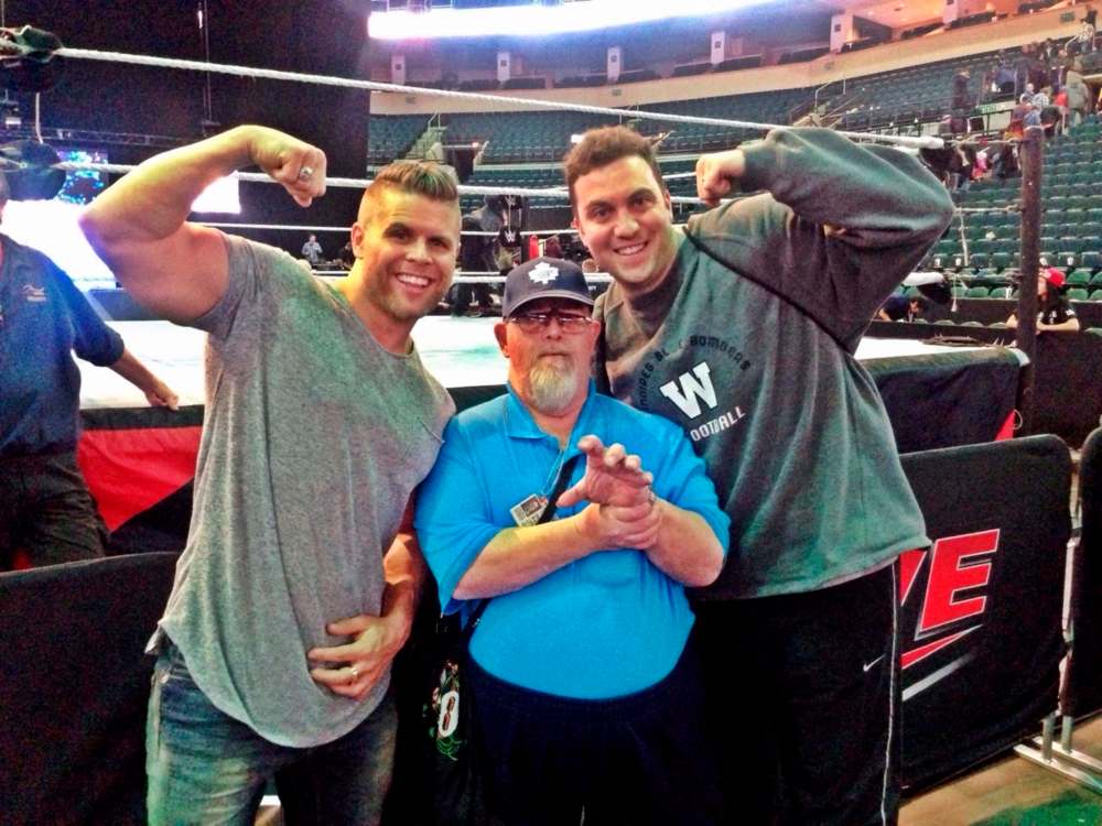 SUBMITTED
Bob Vipond with two of his nephews, Craig Franczyk (left) and Matt Opalko. Here, he imitates ‘the Claw’s’ signature hand gesture.