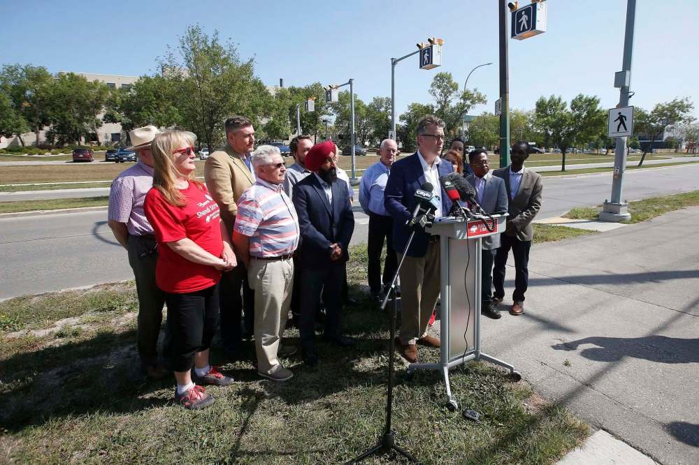 Dougald Lamont, leader of the Manitoba Liberal party, speaks at a press conference outside the Concordia Hospital in Winnipeg Sunday. (John Woods / Winnipeg Free Press)