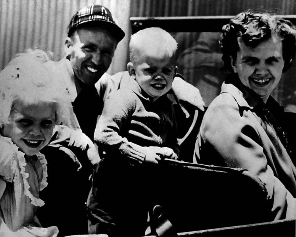The Associated Press files
In this 1956 photo, American missionary Nate Saint, wearing a hat, poses with his daughter, Kathy (left), son Steve, and wife, Marjorie, just days before Nate was killed. In her novel, Thomas creates a fictional son for Saint, David, who narrates the contemporary sections of her book.