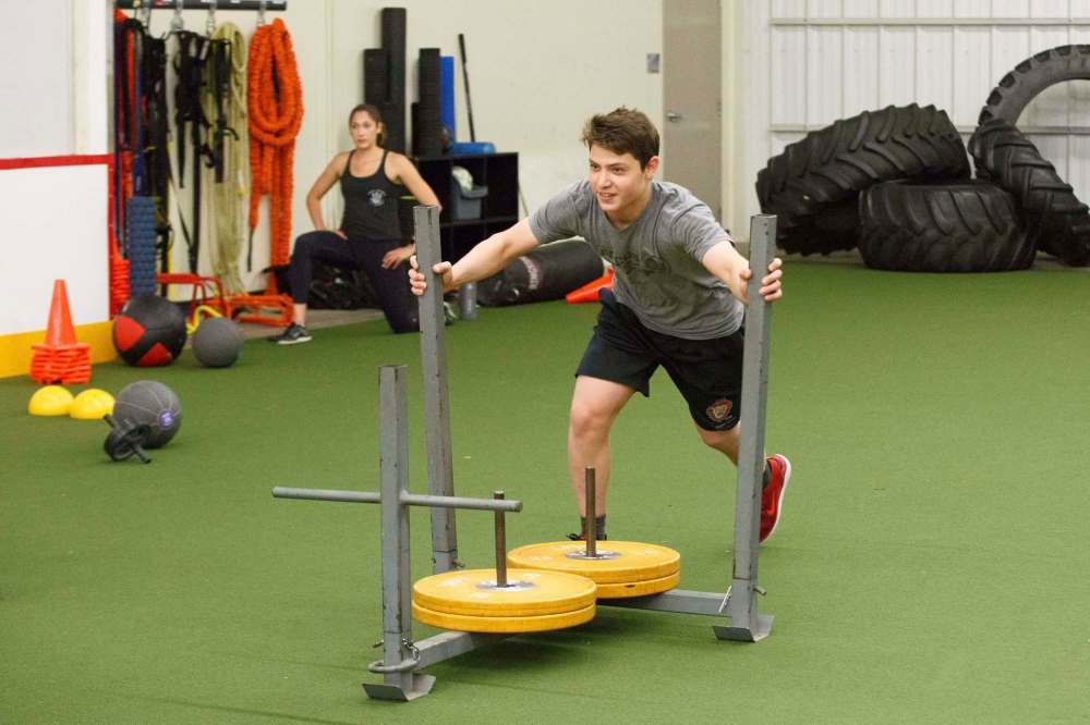 Guy was limited by the language barrier at first but his improvement on the ice has gone hand in hand with cultural transition, aided by three years at Gray Academy and many hours of instruction at the Iceplex. (Mike Deal / Winnipeg Free Press)