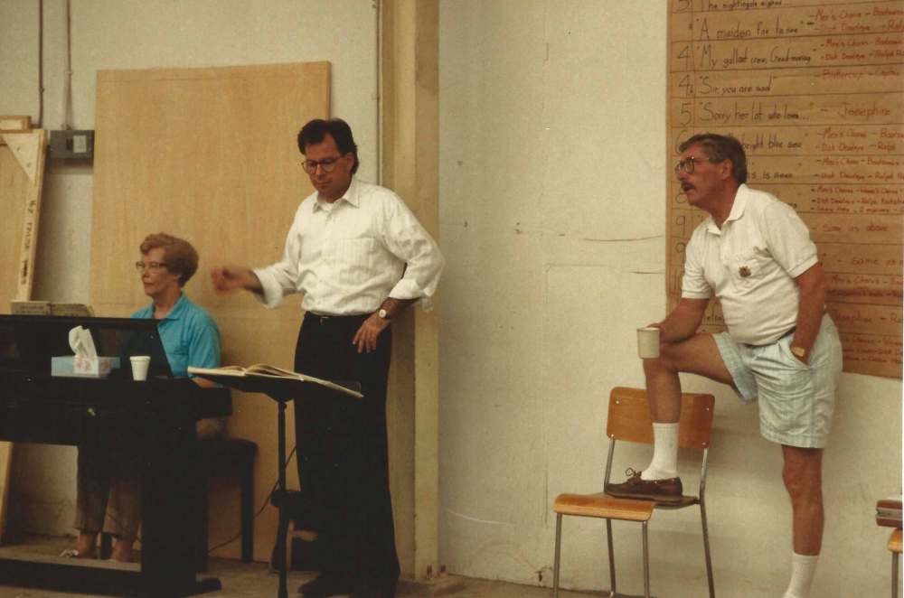SUPPLIED
In 1993, Margaret Harrison (from left) with conductor Carlisle Wilson (conductor for first seven Gilbert & Sullivan Society shows) and husband Glen Harrison in rehearsal for H.M.S. Pinafore.