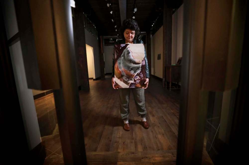 Artist Susan P. Gibson’s first solo show, Grief Work, includes photos she took to process the unexpected death of her husband in 2011. (Ruth Bonneville / Winnipeg Free Press)