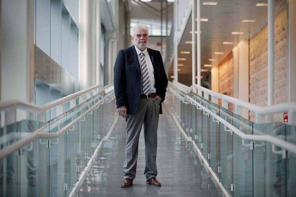 JOHN WOODS / THE CANADIAN PRESS FILES
Former director general Frank Plummer recalls a high-pressure environment at the lab.
