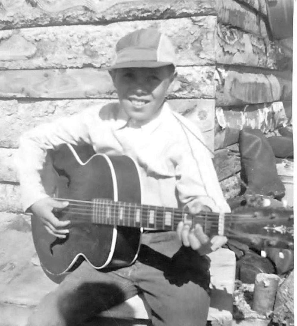 Supplied
Little Wild Bill Flamond playing guitar