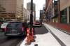 The city recently narrowed the sidewalk on the west side of Main Street at Bannatyne Avenue to create a loading zone. (Phil Hossack / Winnipeg Free Press)