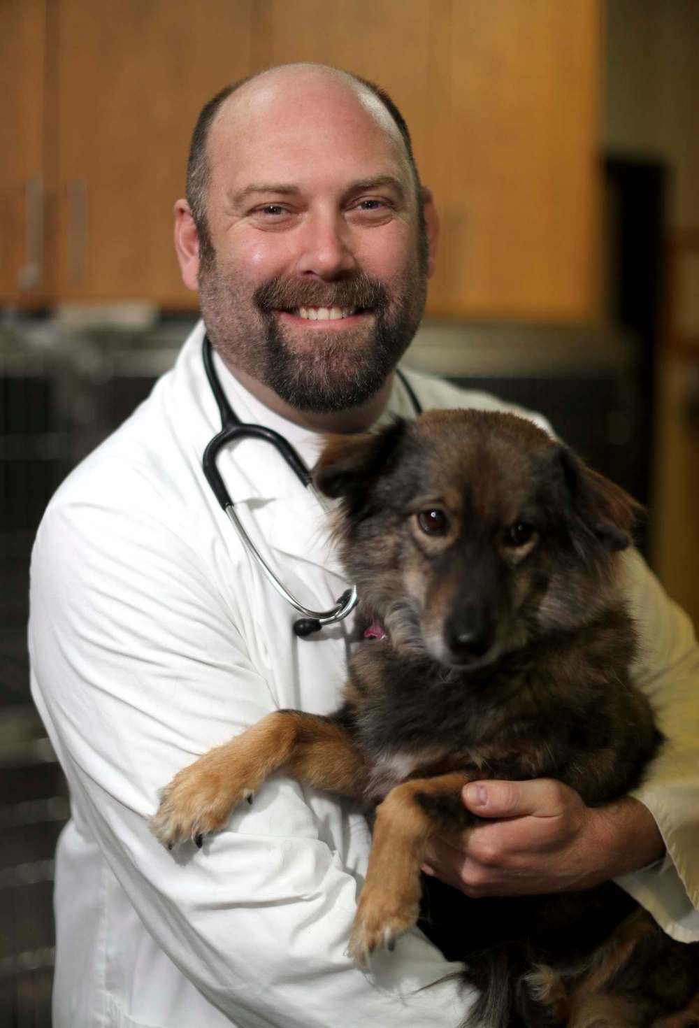 Dr. Jonas Watson, and his rescue dog, Karma. (Winnipeg Free Press files)