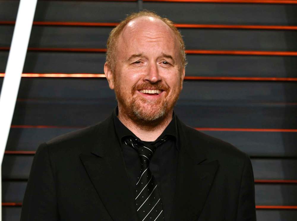FILE - In this Feb. 28, 2016 file photo, Louis C.K. arrives at the Vanity Fair Oscar Party in Beverly Hills, Calif. The actor-comedian has pushed pause on his FX series and is launching a year-long stand-up comedy tour comprised of all-new material. (Photo by Evan Agostini/Invision/AP, File)