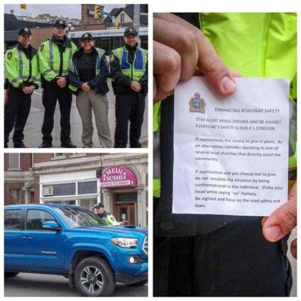 SUPPLIED
On Friday the Winnipeg Police Service sent a handful of officers in high-visiblity yellow jackets to city intersections to talk to motorists about the importance of staying alert behind the wheel. The officers gave out slips of paper that encourage motorists to “be vigilant” and focus on the laws of the road.