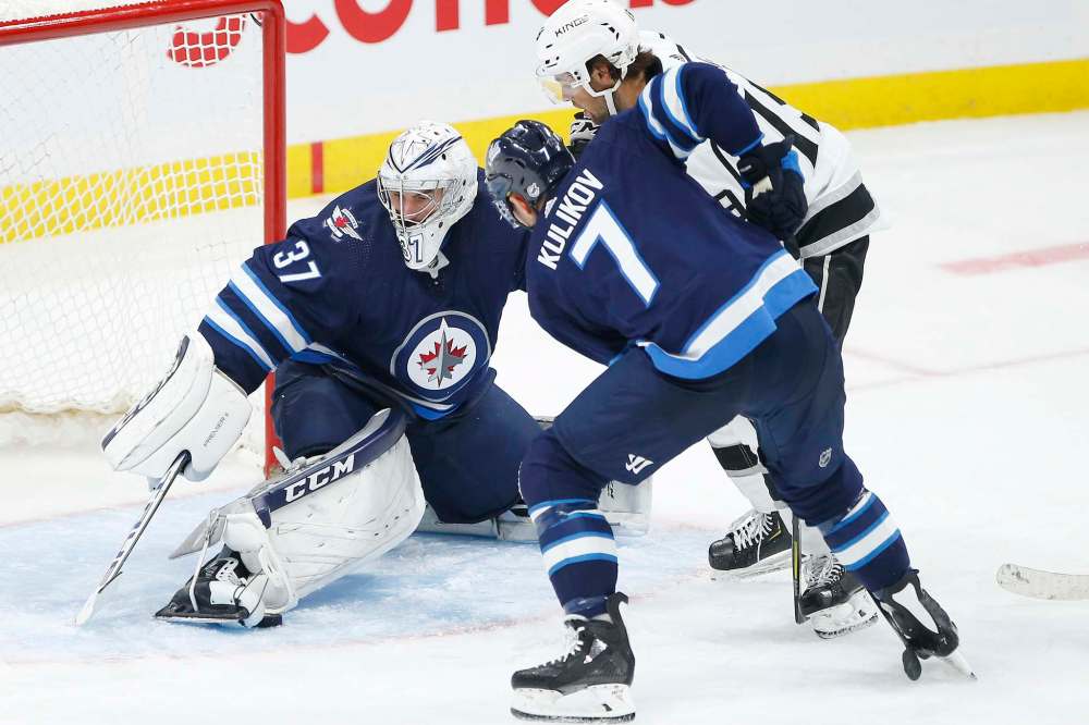 Last season, Connor Hellebuyck faced more difficult shots more often, and the easy shots that boost save percentage went down. (John Woods / Winnipeg Free Press files)