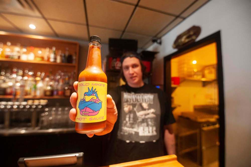 Magic Bird's Mike O'Connell created his own extra-spicy sauce, Cold Mike's Hot Sauce. (Mike Sudoma / Winnipeg Free Press)