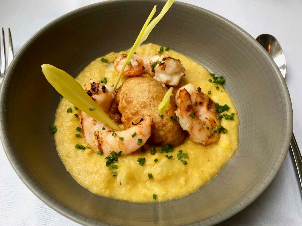 Corn chowder with grilled prawns and a fritter from Tredwells. (Steve Lyons / Winnipeg Free Press)