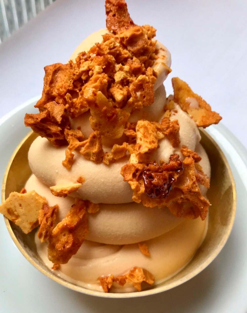 Carmel soft serve ice cream with honeycomb.