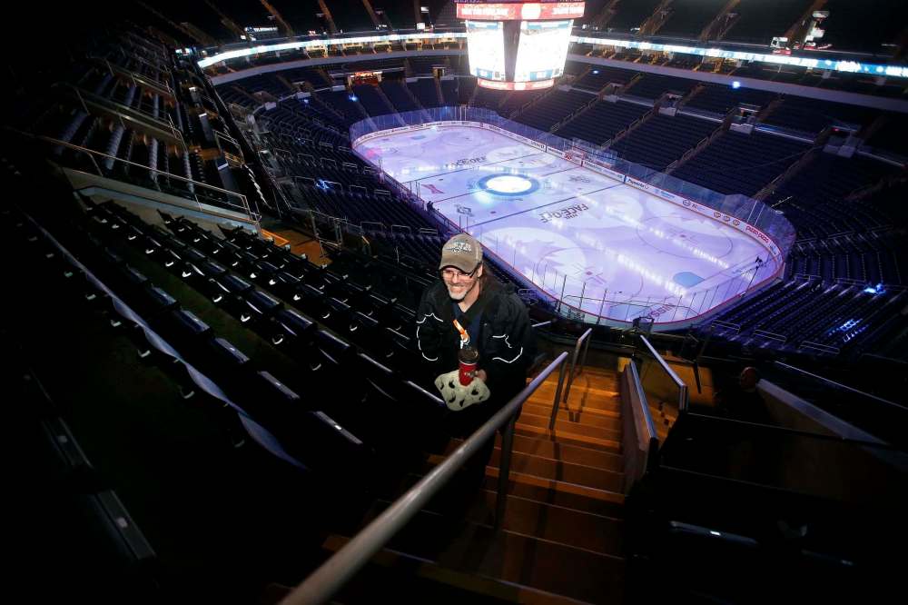 JOHN WOODS / WINNIPEG FREE PRESS
Eccles climbs the stairs to the top row of Section 317, where the organist’s ‘hobbit hole’ is located.