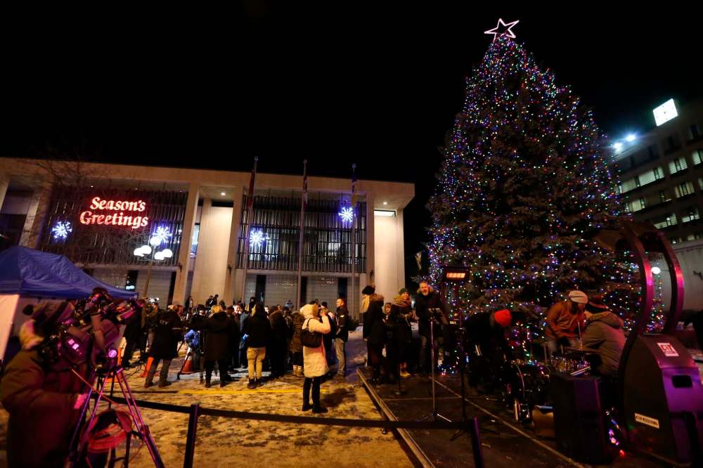 The mayor usually lights the tree at a ceremony, which might not happen this year. (Trevor Hagan / Winnipeg Free Press files)
