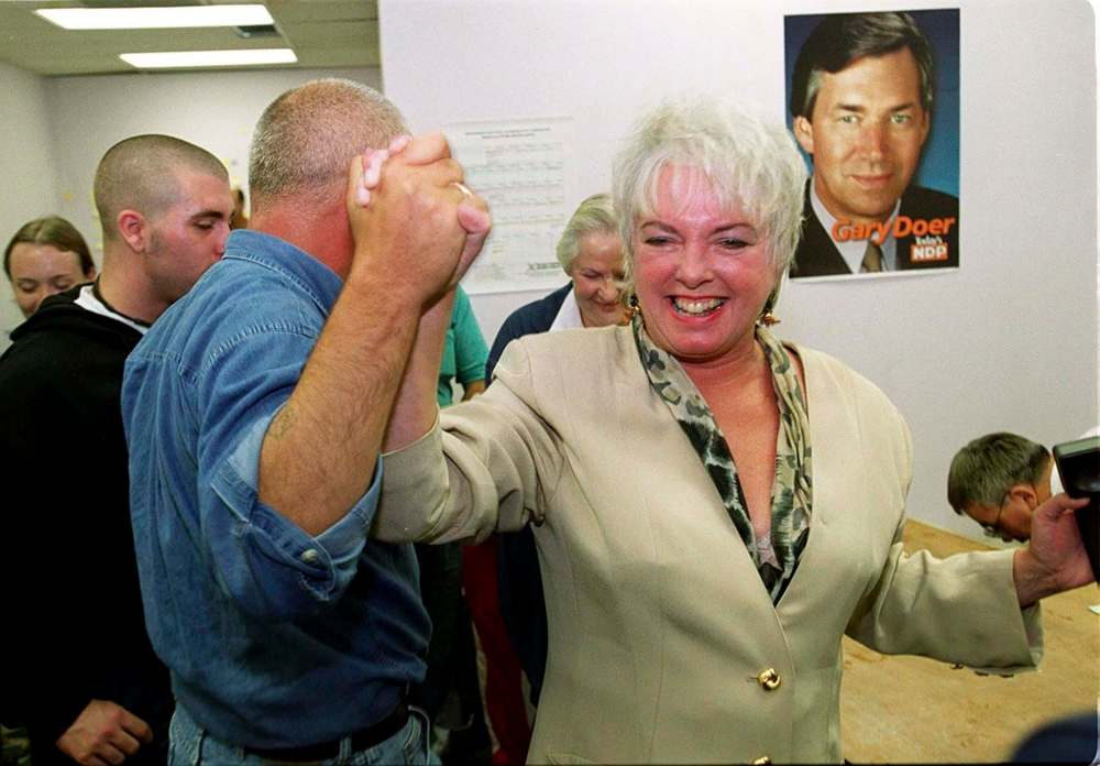 Bonnie Korzeniowski celebrates her win in St. James in 1999. (KEN GIGLIOTTI /WINNIPEG FREE PRESS FILES)