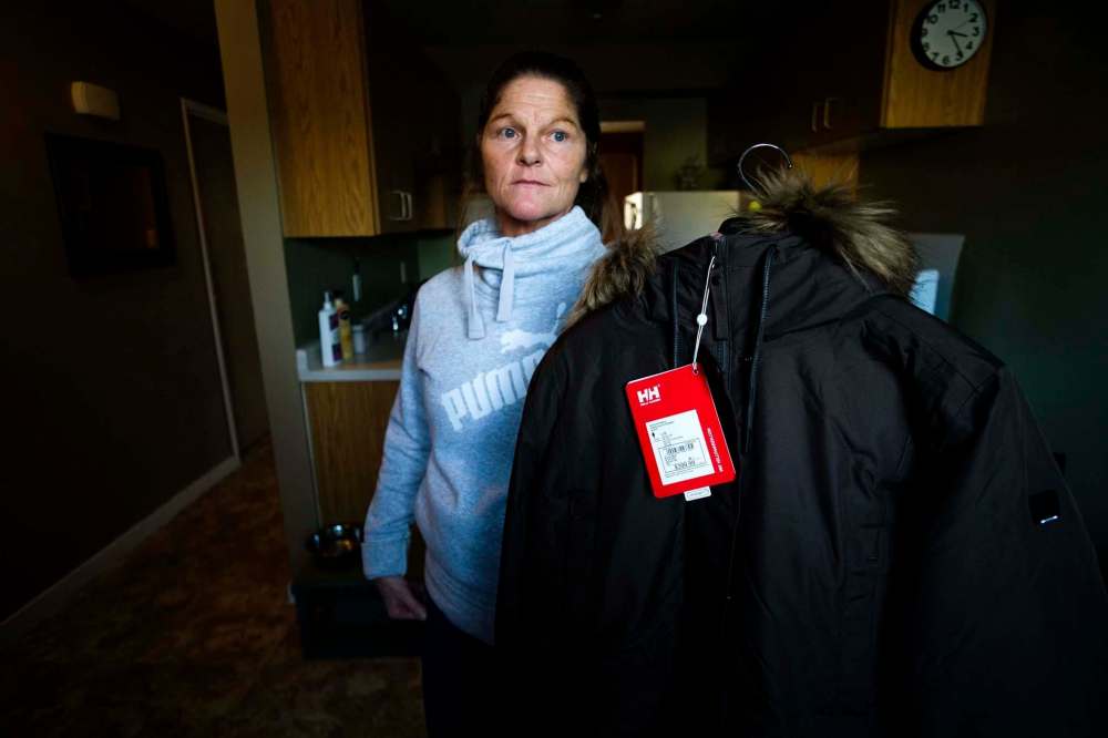 Daniel Crump / Winnipeg Free Press
Allison Northmore had to pay PST on her 14-year-old daughter’s winter jacket and boots. Clothing items for children under 14 and under $150 are exempt from the tax.