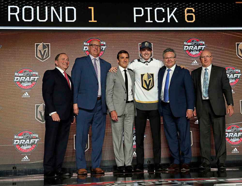 CP
Cody Glass, third from right, wears a Vegas Golden Knights jersey after being selected by the team in the first round of the NHL hockey draft, Friday, June 23, 2017, in Chicago. (AP Photo/Nam Y. Huh)