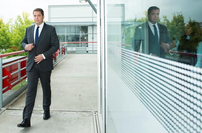 Federal Conservative leader Andrew Scheer arrives before making a campaign announcement in Montreal, Que., on Thursday, September 26, 2019. THE CANADIAN PRESS/Nathan Denette