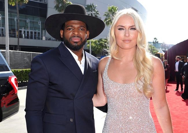 FILE - In this July 10, 2019 file photo, P. K. Subban of the New Jersey Devils, left, and Lindsey Vonn arrive at the ESPY Awards at the Microsoft Theater in Los Angeles. Vonn and P.K. Subban say they’re engaged. Vonn, a three-time Olympic champion in Alpine skiing, and Subban, a defenseman for the NHL’s New Jersey Devils who won a Winter Games hockey title with Canada, posted the good news on social media on Saturday, Aug 24. (Photo by Richard Shotwell/Invision/AP, File)