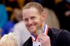 FILE - In this Jan. 11, 2014, file photo, bronze medalist John Coughlin smiles during an award ceremony at the U.S. Figure Skating Championships in Boston. Former Olympian Ashley Wagner says she was sexually assaulted by another figure skater in 2008 when she 17. The three-time national champion writes in USA Today on Thursday, Aig. 1, 2019, that John Coughlin climbed into her bed after a party at a skating camp and began kissing and groping her. Coughlin was 22 at the time and took his life in January at 33. Wagner says she was 