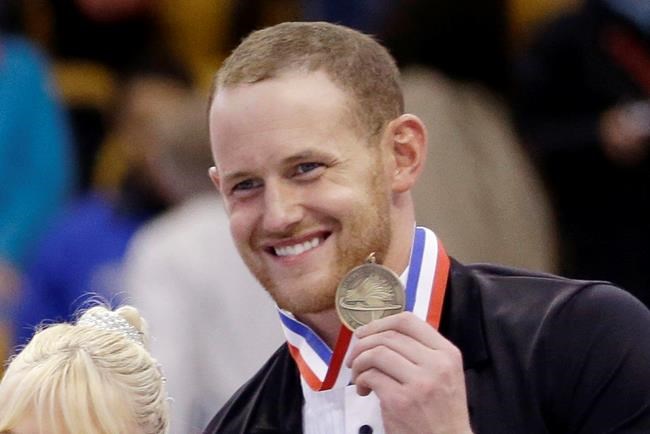 FILE - In this Jan. 11, 2014, file photo, bronze medalist John Coughlin smiles during an award ceremony at the U.S. Figure Skating Championships in Boston. Former Olympian Ashley Wagner says she was sexually assaulted by another figure skater in 2008 when she 17. The three-time national champion writes in USA Today on Thursday, Aig. 1, 2019, that John Coughlin climbed into her bed after a party at a skating camp and began kissing and groping her. Coughlin was 22 at the time and took his life in January at 33. Wagner says she was