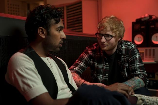 This image released by Universal Pictures shows Himesh Patel, left, and Ed Sheeran in a scene from