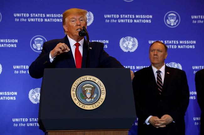 Secretary of State Mike Pompeo listens as President Donald Trump speaks during a news conference at the InterContinental Barclay New York hotel during the United Nations General Assembly, Wednesday, Sept. 25, 2019, in New York. (AP Photo/Evan Vucci)