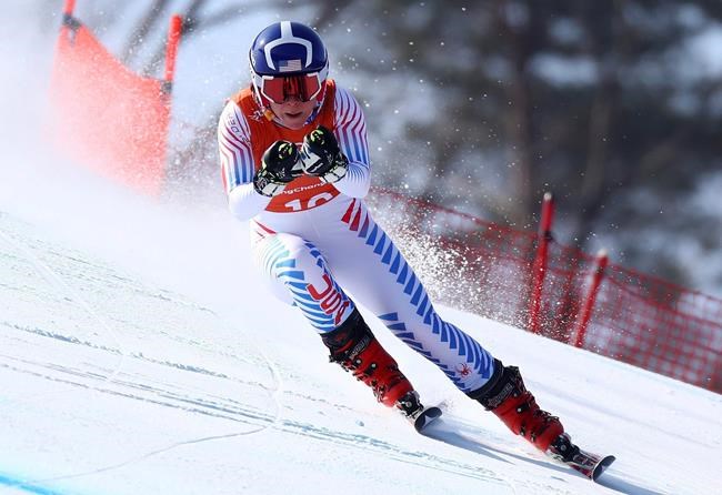 FILE - In this Feb. 20, 2018, file photo United States' Breezy Johnson competes in women's downhill training at the 2018 Winter Olympics in Jeongseon, South Korea. Johnson tore a ligament in her knee during a second straight offseason training session. (AP Photo/Alessandro Trovati, File)
