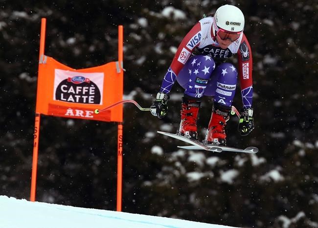 FILE - In this March 14, 2018, file photo United States' Breezy Johnson speeds down the course during a women's downhill, at the alpine ski World Cup finals in Are, Sweden. Johnson tore a ligament in her knee during a second straight offseason training session. (AP Photo/Alessandro Trovati, File)