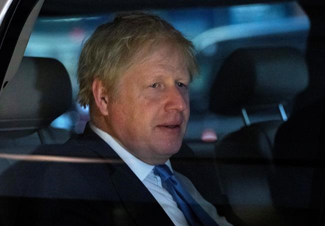 British Prime Minister Boris Johnson leaves his hotel, Tuesday, Sept. 24, 2019, in New York. (AP Photo/Mark Lennihan)