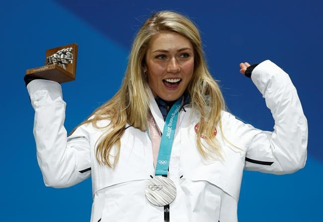 FILE - In this Feb. 22, 2018 file photo silver medalist in the women's combined Mikaela Shiffrin, of the United States, celebrates during the medals ceremony at the 2018 Winter Olympics in Pyeongchang, South Korea. Shiffrin will be counted on to carry her sport even more with the retirements of such big names as Lindsey Vonn, Marcel Hirscher and Aksel Lund Svindal. That's a lot of pressure for the 24-year-old who's coming off a season in which she recorded a record 17 World Cup wins. (AP Photo/Patrick Semansky, file)