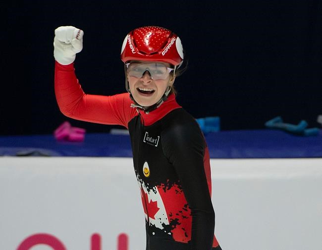 Canadian speedskater Kim Boutin celebrates her first-place finish in the 1000m final at the ISU World Cup Short Track competition in Montreal, Quebec on Saturday, November 9, 2019. THE CANADIAN PRESS/Peter McCabe