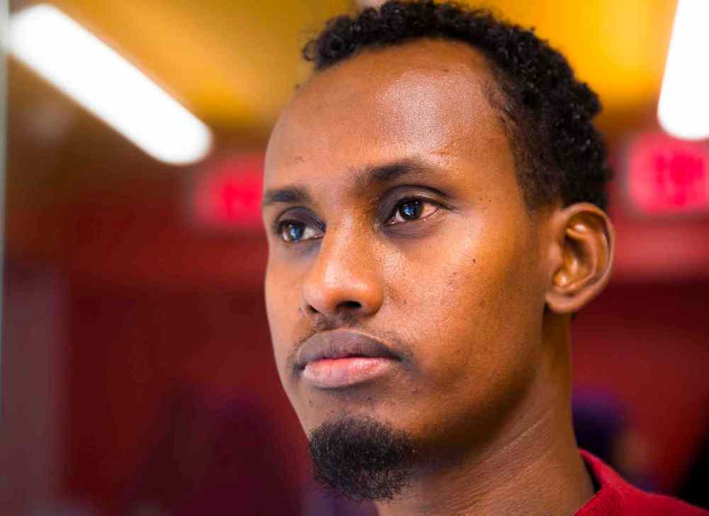 Yahya Samatar at the Welcome Place in Winnipeg on Wednesday, Aug. 12, 2015.  Samatar spent days filling out many complex documents with help from staff after he came to Manitoba seeking asylum. (Mikaela MacKenzie / Winnipeg Free Press files)