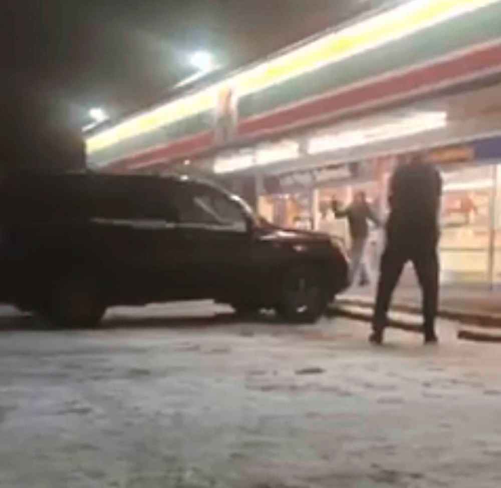 FACEBOOK
A still image taken from video posted to Facebook showing an officer-involved shooting outside the 7-11 at Arlington and Ellice in Winnipeg Thursday.