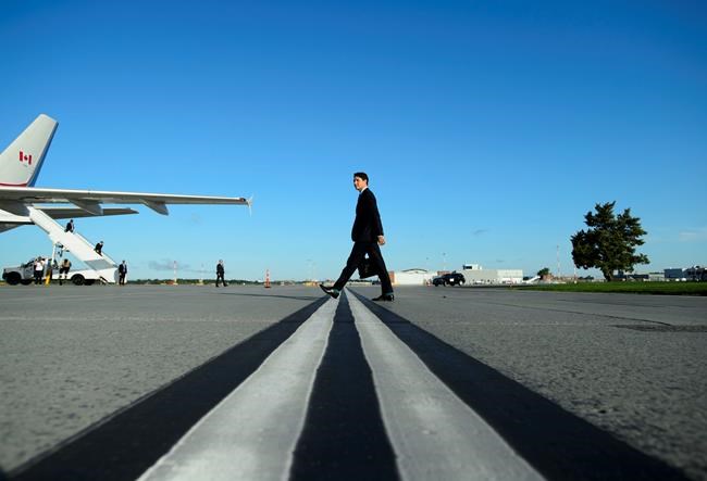 Prime Minister Justin Trudeau departs Ottawa on Friday, Aug 23, 2019., on route to France to attend the G7 Summit. THE CANADIAN PRESS/Sean Kilpatrick