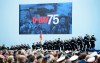 Soldiers march on stage during the D-Day 75th Anniversary British International Commemorative Event at Southsea Common in Portsmouth, England on Wednesday, June 5, 2019. THE CANADIAN PRESS/Sean Kilpatrick