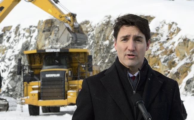 Prime Minister Justin Trudeau talks to media as he visits a construction site in Sudbury, Ont., on Wednesday, Feb. 13, 2019. CANADIAN PRESS/Sean Kilpatrick