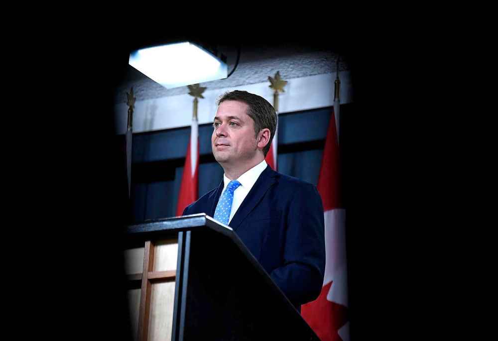 Conservative leader Andrew Scheer to Prime Minister Justin Trudeau on Trudeau's threatened libel suit: bring it. JUSTIN TANG / THE CANADIAN PRESS FILES