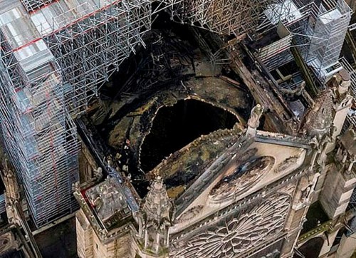An image made available by Gigarama.ru on Wednesday April 17, 2019 shows an aerial shot of the fire damage to Notre Dame cathedral in Paris on Tuesday April 16. Nearly $1 billion has already poured in from ordinary worshippers and high-powered magnates around the world to restore Notre Dame Cathedral in Paris after it was damaged in a massive fire on Monday. (Gigarama.ru via AP)