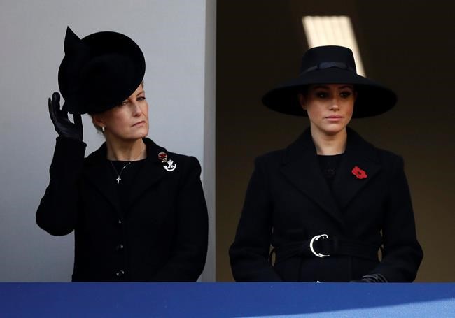 Meghan, Duchess of Sussex, right, and Sophie, Countess of Wessex attend the Remembrance Sunday ceremony at the Cenotaph in Whitehall in London, Sunday, Nov. 10, 2019. Remembrance Sunday is held each year to commemorate the service men and women who fought in past military conflicts. (AP Photo/Matt Dunham)